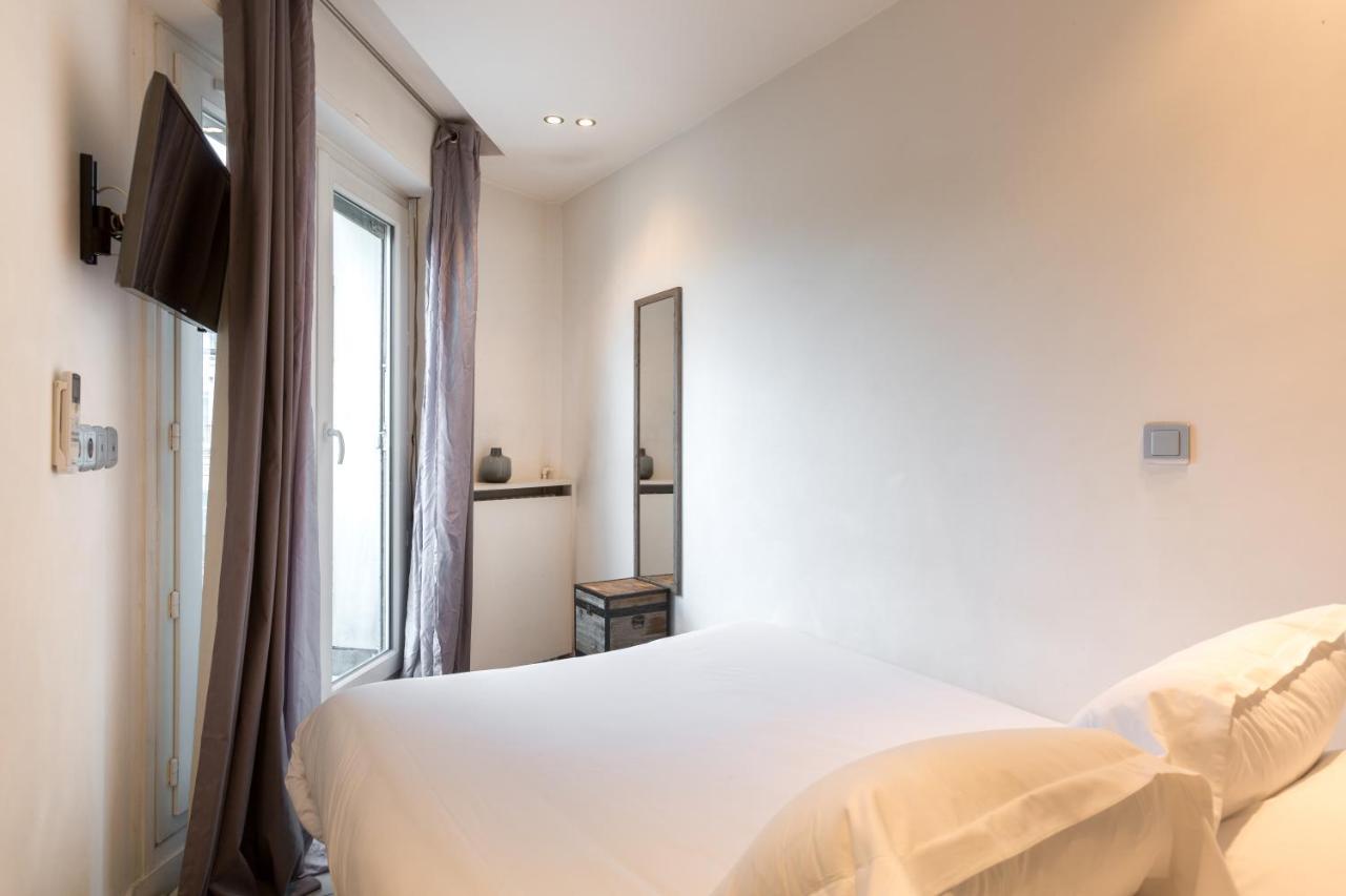 Habitat Parisien - Appartement Opera Galeries Lafayette Bagian luar foto