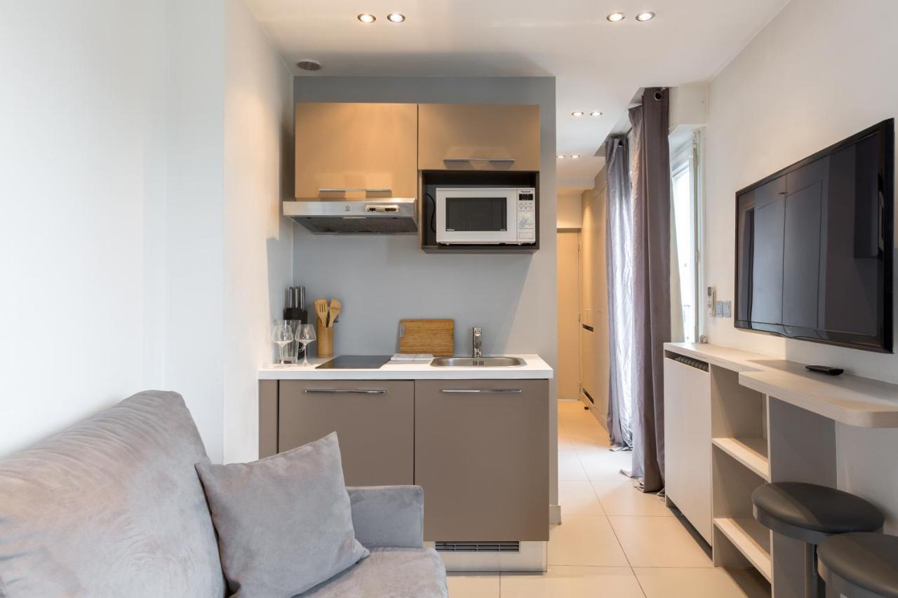 Habitat Parisien - Appartement Opera Galeries Lafayette Bagian luar foto