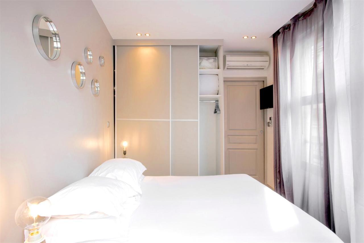 Habitat Parisien - Appartement Opera Galeries Lafayette Bagian luar foto